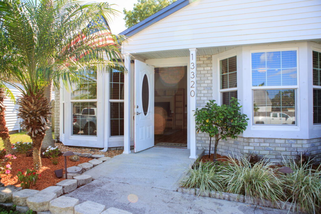 Living room of an accessible South Florida home with wide, open circulation