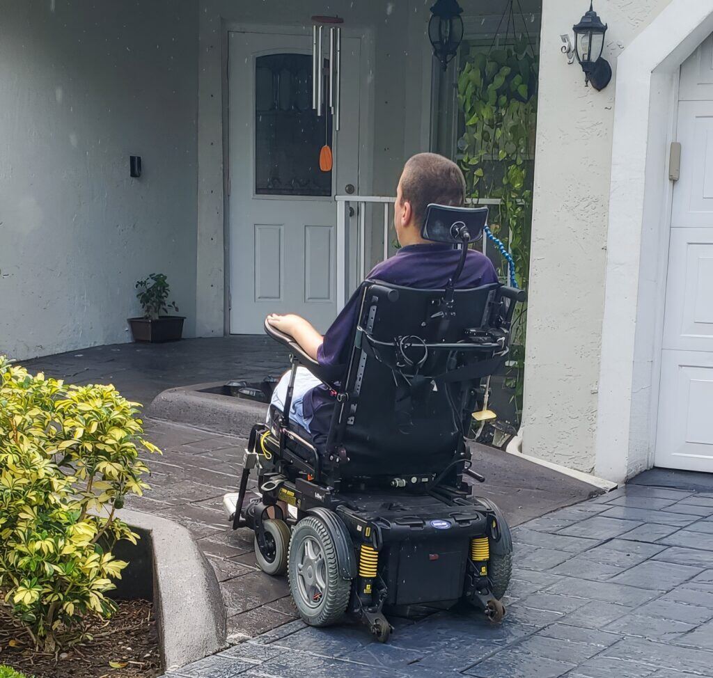 A wheelchair-accessible ramp at the entrance of a South Florida home